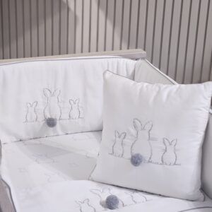 cot dressed with the grey bunny pom bedding set by The Baby Store