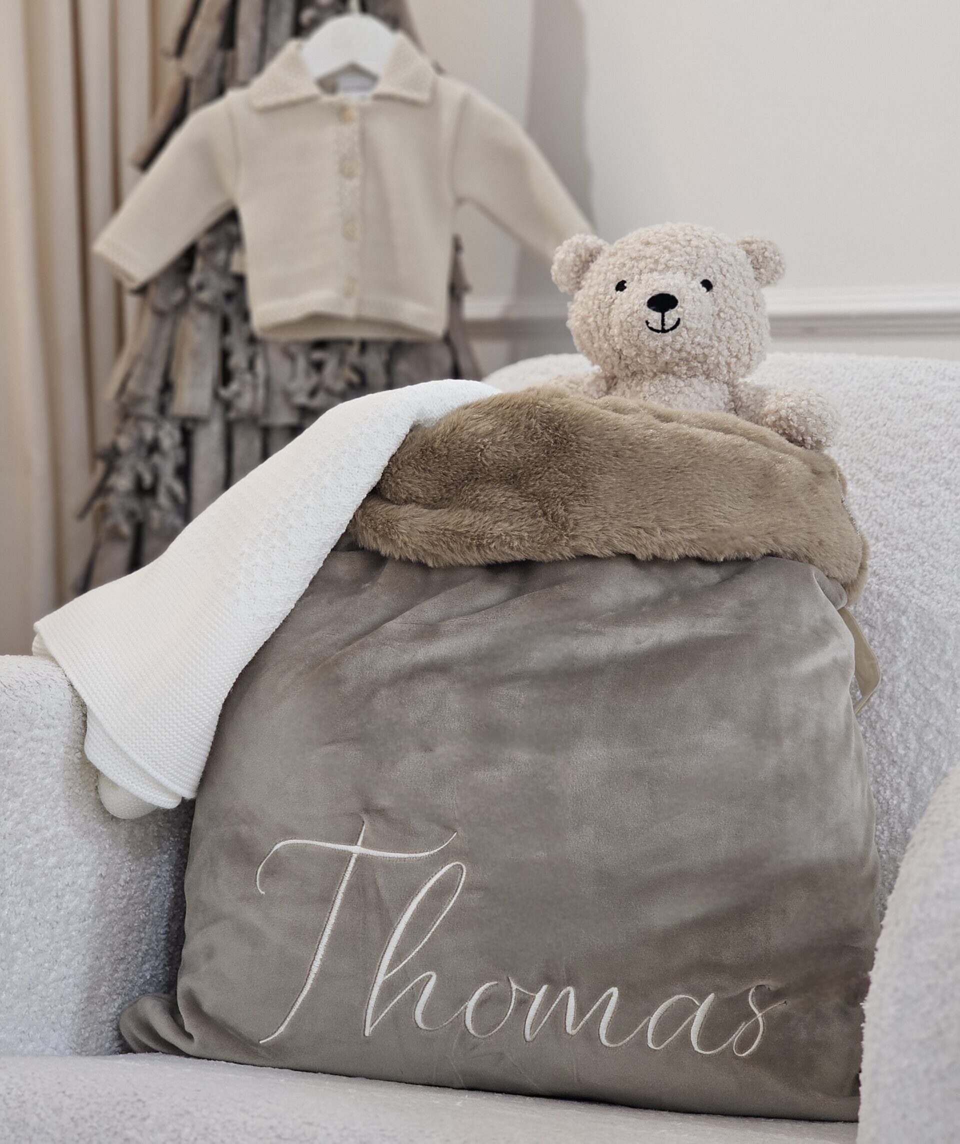 Brown Velvet Personalised Sack displayed with selection of toys and accessories.