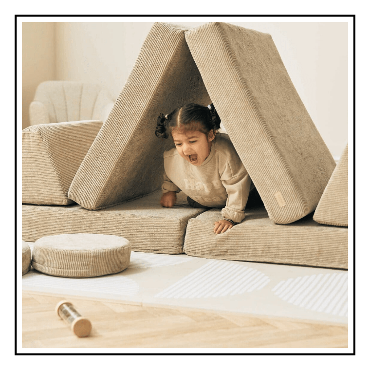 child enjoying active play with the Tutti Bambini Montessori Kids Play Sofa