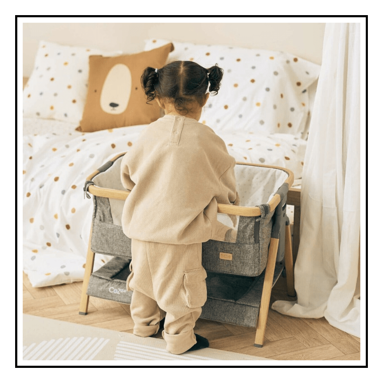 toddler enjoying play furniture with the Tutti Bambini CoZee Mini Me Play Crib