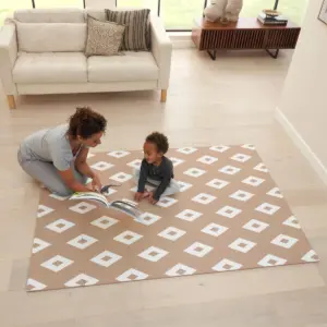 woman and child playing on Tutti Bambini puzzle playmat in Diamond Cinnamon