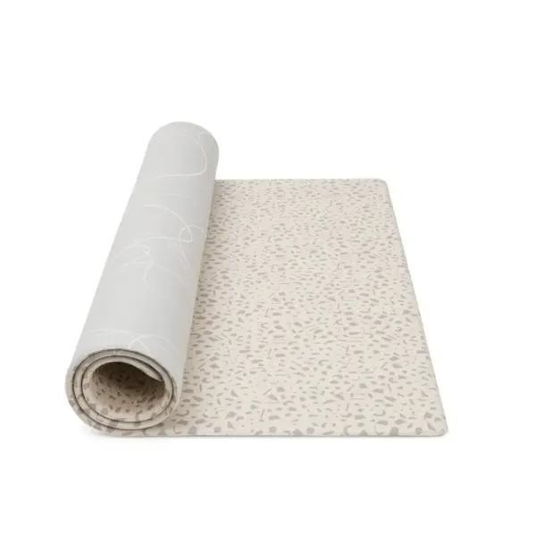 Tutti Bambini Luxury Padded XL Reversible Play Mat rolled up for storing