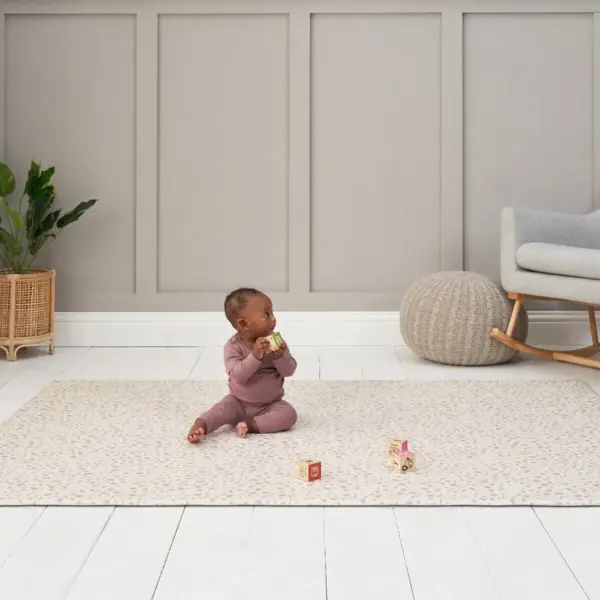 baby playing on the Tutti Bambini Luxury Padded XL Reversible Play Mat