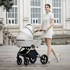 woman pushing Babymore Kai pram pushchair in Sandstone