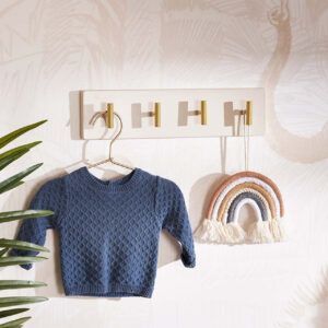 the Obaby Evie Wall Hooks in Cashmere displaying nursery items